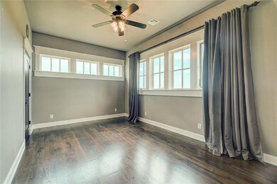 Front bedroom with large walk-in closet.