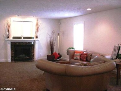 Exterior Front - Comfortable lilving room allows plenty of furniture to make entertaining in this open floor plan delightful.