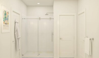 Primary bath with glass shower enclosure