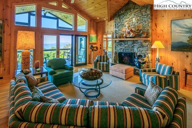 VAULTED CEILINGS, HUGE WINDOWS, GORGEOUS STONE FIR