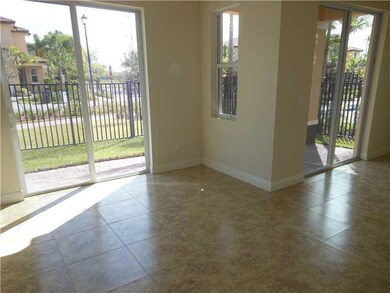Den/Family/Great Room. VIEW TO COVERED PORCH FROM
