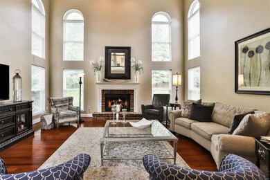 SOARING 2-STORY GREAT ROOM FLOODED WITH NATURAL LI