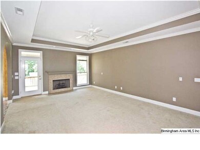 Living room with gas fireplace.