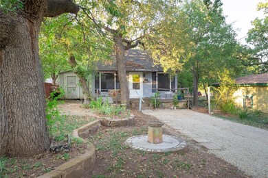 View of property hidden behind natural elements