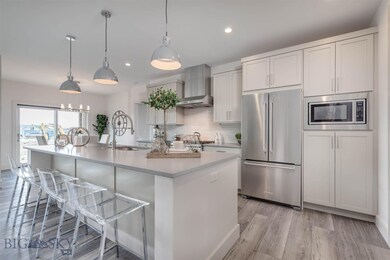 Open concept kitchen with upgraded Kitchenaid appl