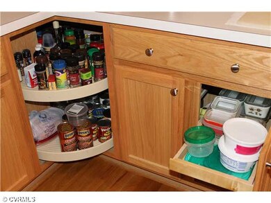Kitchen - A corner lazy susan and cabinet slideout