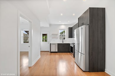 3087 N Elbridge Ave unit 1F, Chicago, IL 60618 - photo 2