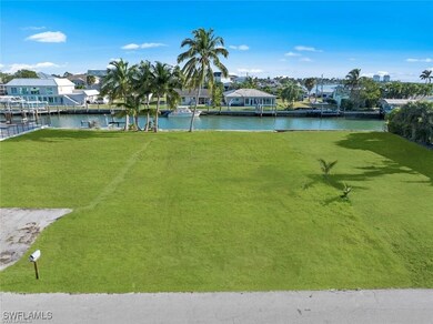 View of property's community featuring a yard and