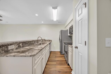 Kitchen with appliances with stainless steel finis