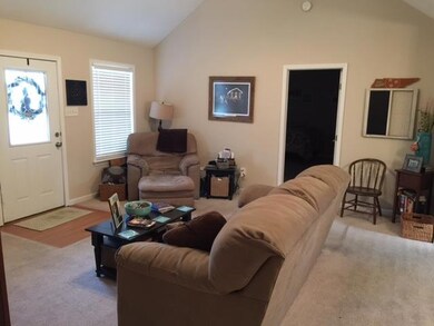 Open Living Room with Cathedral Ceilings