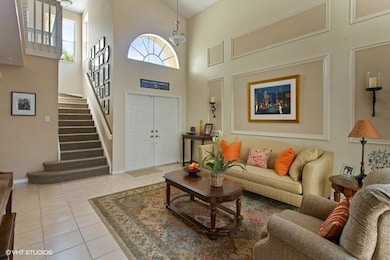 DOUBLE DOOR ENTRANCE TO LIVING ROOM