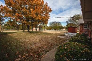 Gate in back yard opens up to Broadlawn Park, near