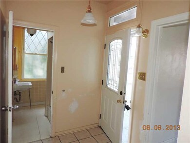 Entry/Foyer. The entry has a lovely leaded glass d