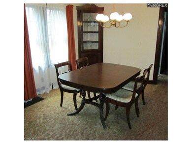 FORMAL DINING ROOM BOASTS GORGEOUS NATURAL WOODWOR