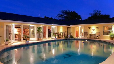 French doors open to Pool
