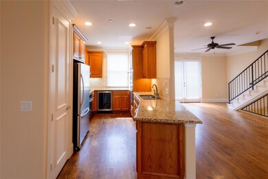 Kitchen featuring a healthy amount of sunlight, si