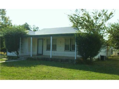 Exterior Front. Inviting front porch on a large co