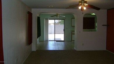 Living area looking into kitchen.