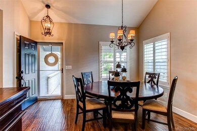 Gorgeous entry features custom shutters & tile wood-like flooring throughout most of main level. New taller baseboard trim as well. New glass & screen front door.