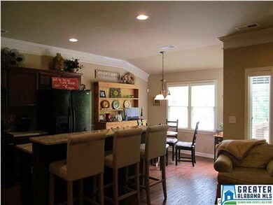 View of kitchen showing how large the eat in area 
