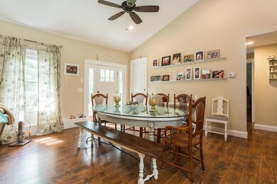 The entry leads into the dining room...