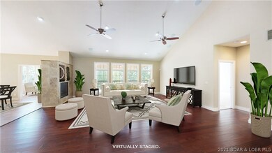 Lots of natural light in the living area -w/vaulte
