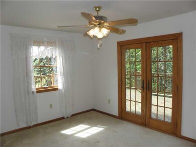 Dining Room. Sun-filled Dining Room featuring Glas