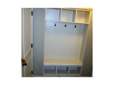 Who doesn't love a mud room for the backpacks and 