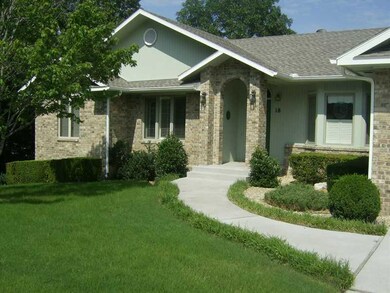 Exterior Front. Notice the plantation shutters,lus