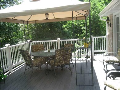 Patio/Deck. Back deck is off of the sunroom, dinin