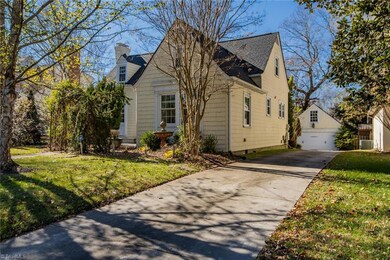 Plenty of parking on the paved driveway that extends behind the home