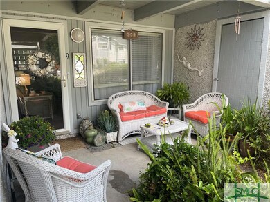 Check out this cute front porch - so inviting!
