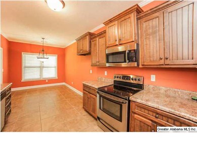 Kitchen has stainless appliances