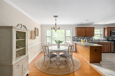 Dining space open to kitchen, plenty of room for l