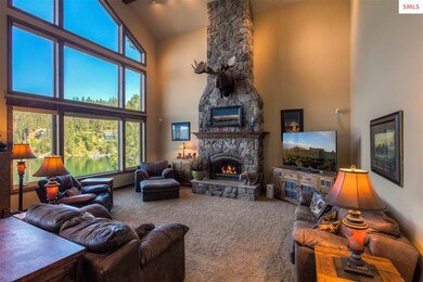 Beautiful stone Fireplace anchors the room - propa