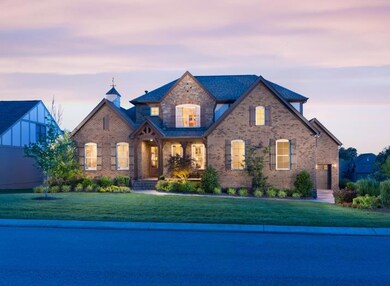 Photo is of a model home with the same front and 3rd garage as this listing. Colors will vary.