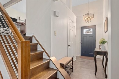 Great entry way hall with half bath and coat close