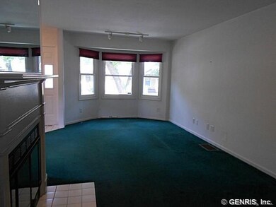 Living Room. The living room has a bay front windo