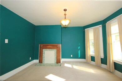 This picture focuses on the decorative fireplace w