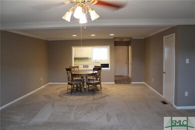 Looking from great room into dining and kitchen ar