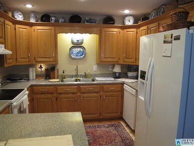kitchen has new appliances, upgraded oak cabinets,
