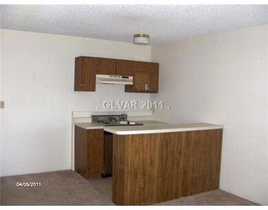 Other. Familyroom with wet bar & refrig, two burne