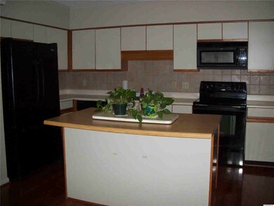 Huge Island And Lots Of Cupboards & Cabinets In This Delightful Kitchen