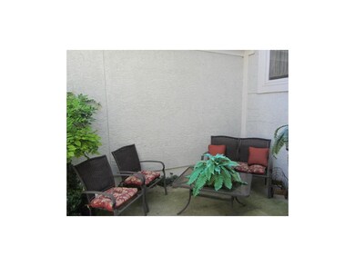 Relax on your private front porch patio.