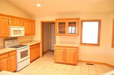 The Utility Room is just off the Kitchen.