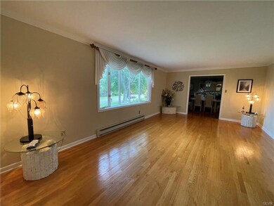 LR with HW Floors, Bay Window, flows into DR