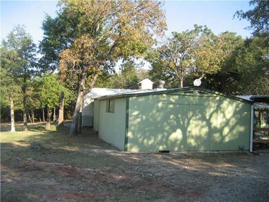 Exterior Front. View of 2 buildings on property ow