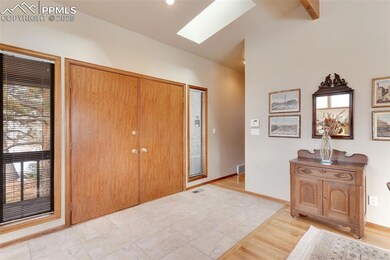 Entryway with double doors and tiled entryway