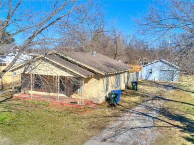 House with garage in background
