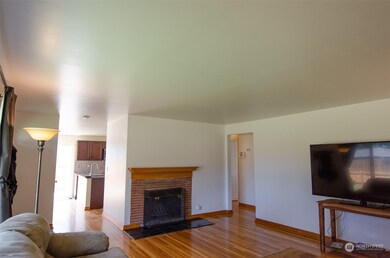 Living room with original hardwood